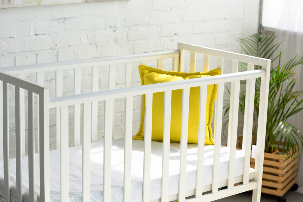 mini crib vs. crib - accessories - crib mattress