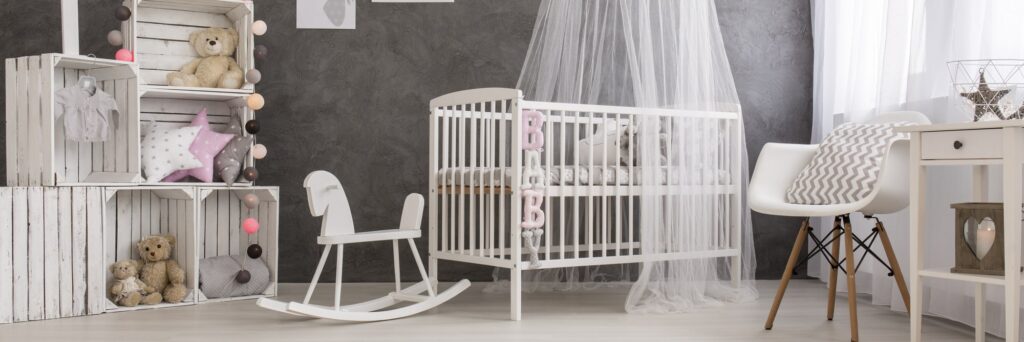 So what is a mini crib? Well, as you might have guessed, a mini crib is a smaller version of a standard baby crib. 